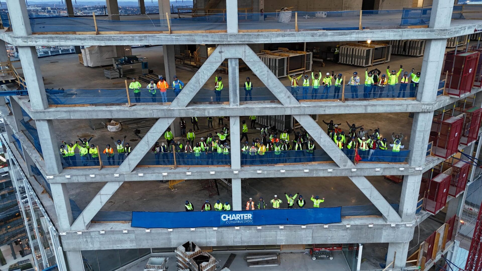 charter construction employees posing on construction site